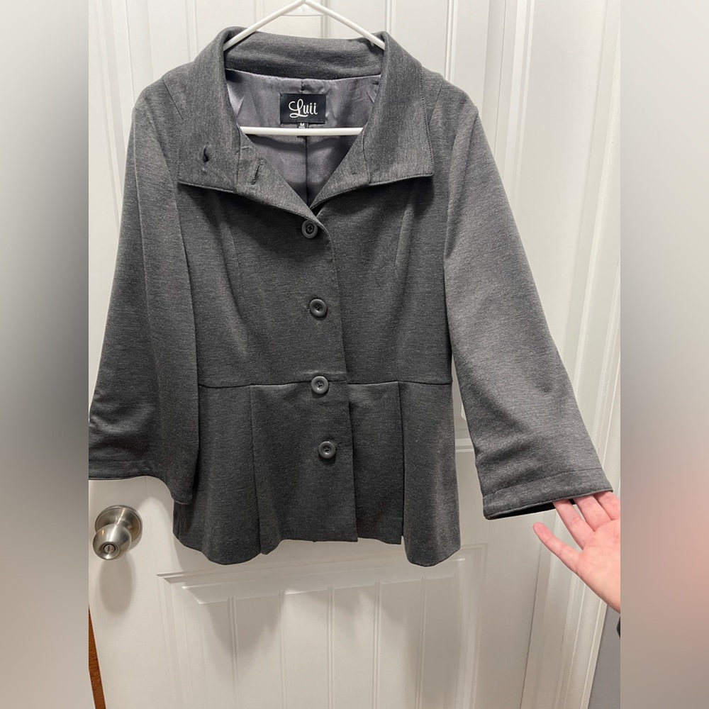 Super cute lined jacket with flared sleeves. Never worn, tags still in tact!